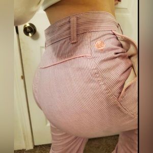 Pink straight leg jeans.